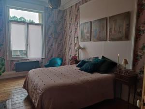 Postel nebo postele na pokoji v ubytování Rose's room