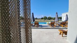 Bazén v ubytování Olympia Suites nebo v jeho okolí