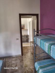 Postel nebo postele na pokoji v ubytování B&B Figura Apartments