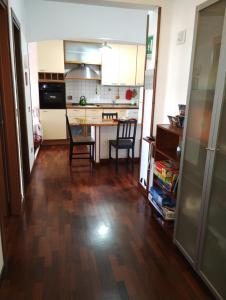 A kitchen or kitchenette at Checchi House