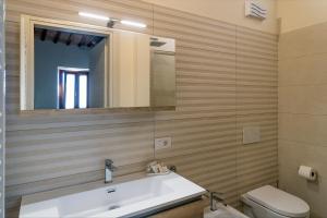 Ванна кімната в Dimo' Rè