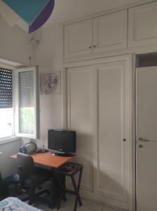 TV a/nebo společenská místnost v ubytování Pineta Sacchetti Camera