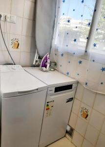 Kuchyň nebo kuchyňský kout v ubytování Acogedor Apartamento Segunda Linea Playa-Gandía