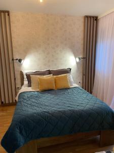 Ένα ή περισσότερα κρεβάτια σε δωμάτιο στο Apartman Bela Reka Zlatibor