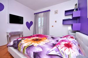 Ένα ή περισσότερα κρεβάτια σε δωμάτιο στο Apartments Ruzarija +33 φωτογραφίες