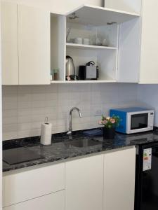 Una cocina o kitchenette en Luxury Apartments