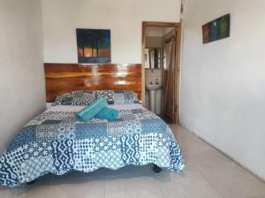 Postel nebo postele na pokoji v ubytování Guest House Villa Machalilla