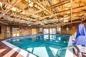 a large indoor swimming pool in a building at Horizon Hideout C202 and 302 in Newport