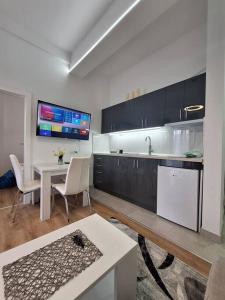 Nhà bếp/bếp nhỏ tại Apricus Apartman Vrnjačka banja