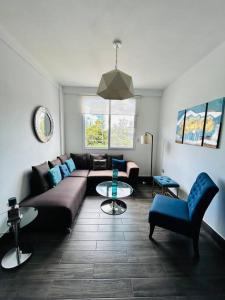 Χώρος καθιστικού στο Great Apartment with Private Terrace near Centro Cívico