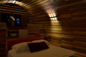 Postel nebo postele na pokoji v ubytování HOTEL EXTASIS ZIPOLITE nudista + 2 fotografie