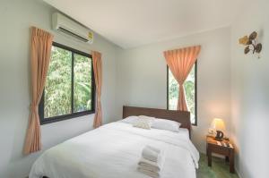 Postel nebo postele na pokoji v ubytování Suptara Resort + 88 fotografií