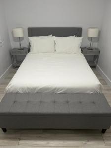 Katil atau katil-katil dalam bilik di Tranquila Suites - III