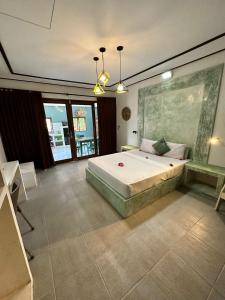 Cama ou camas em um quarto em Villa Anjing 2 mais 37 fotos