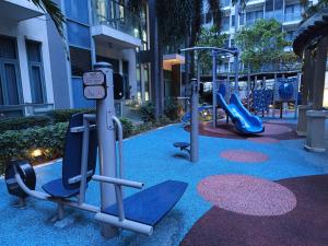 a playground with a slide and a play equipment at 1BR at TWO PALMTREE VILLAS Across Manila airport terminal 3 in Manila