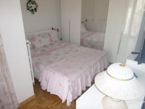 Postel nebo postele na pokoji v ubytování La Terrazza Sul Borgo -Appartamento-