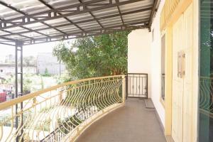 A balcony or terrace at OYO Life 92632 Kost Pondok Kito