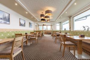 Reštaurácia alebo iné gastronomické zariadenie v ubytovaní Das Aparthotel Olympia Tirol