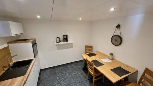 Küche/Küchenzeile in der Unterkunft Handwerkerwohnung-Monteurunterkunft