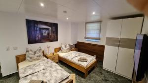 Ein Bett oder Betten in einem Zimmer der Unterkunft Handwerkerwohnung-Monteurunterkunft