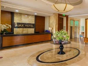 a lobby with a reception desk in a hotel at Ajax Hotel in Limassol +37 photos