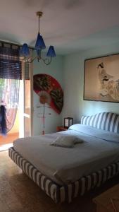 Katil atau katil-katil dalam bilik di Misano Garden Apartment