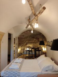 Postel nebo postele na pokoji v ubytování IBLA ROOMS