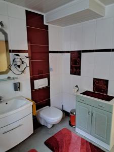Kúpeľňa v ubytovaní Haus Trojer