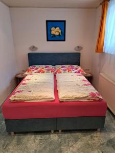 Posteľ alebo postele v izbe v ubytovaní Haus Trojer