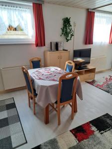 Posedenie v ubytovaní Haus Trojer