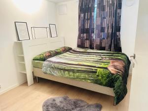 Кровать или кровати в номере «Sea View Apartment Finnøy Island»