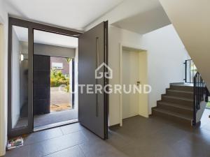 a view from the hallway of a house with a glass door at Studio-Apartment "Charlotte" in Westerstede