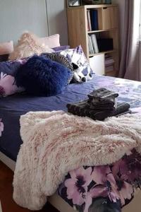 Llit o llits en una habitació de Riverview Place