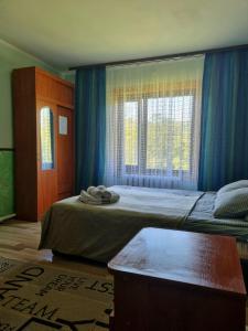 Postel nebo postele na pokoji v ubytování U Tetyany + 62 fotografií