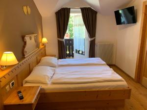 Posteľ alebo postele v izbe v ubytovaní B&B MARINA contacless check in