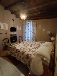 Postel nebo postele na pokoji v ubytování B&B A San Pasquale