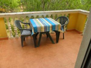 Ein Balkon oder eine Terrasse in der Unterkunft Apartments Marina