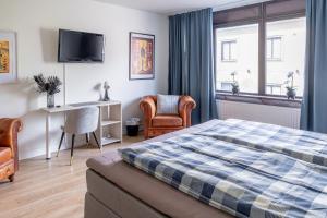 Postel nebo postele na pokoji v ubytování Millners Plaza