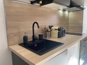 Dapur atau dapur kecil di Le Cocon, Studio à 5 min de la gare de Grenoble