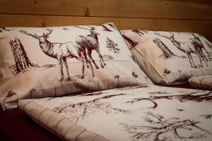 Postel nebo postele na pokoji v ubytování Casa vacanze Al Stalìin
