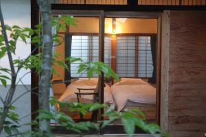 A bed or beds in a room at Hostel Fish in a River
