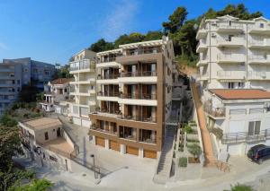 an image of an apartment building at Aparthotel Villa Aria in Budva