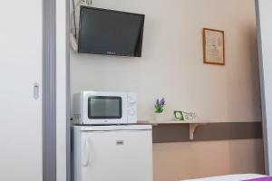 Kuchyň nebo kuchyňský kout v ubytování Hostal Los Mellizos