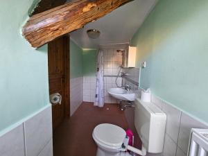 Ein Badezimmer in der Unterkunft Pension Zur Kutscherstube