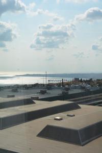 a view of a skate park with the ocean in the background at Hera Emlak in Kırac