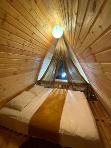 Postel nebo postele na pokoji v ubytování Paradise cottage
