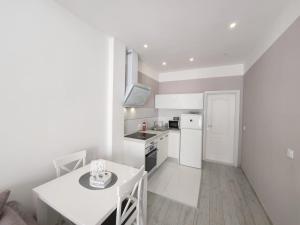 Kuchyňa alebo kuchynka v ubytovaní Apartments Talija Podgora