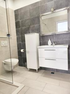 Kúpeľňa v ubytovaní Apartments Talija Podgora