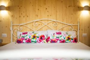 Postel nebo postele na pokoji v ubytování I Sicomori - Seme di Carota - Glamping e appartamenti con piscina a Saturnia