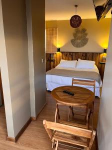 Postel nebo postele na pokoji v ubytování Blumen Hotel